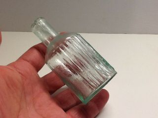 Small Antique Cylinder Ridge Poison Bottle.