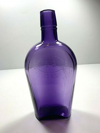 Deep Purple 1/2 Pt Coffin Whiskey Flask Old West Union Trade Mark 1900s Bottle