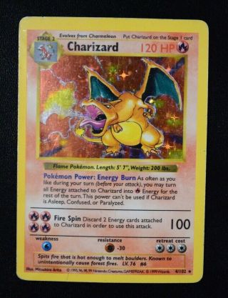 1999 Charizard Shadowless Holo Base Set Pokemon Card.  Rare.  Green Wing.  4/102