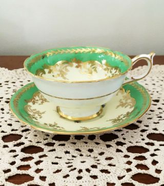 Rare Vintage Paragon Bone China Cup And Saucer Green,  Gold,  Floating Rose